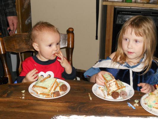 Joshua and Sarah eat cake. 
