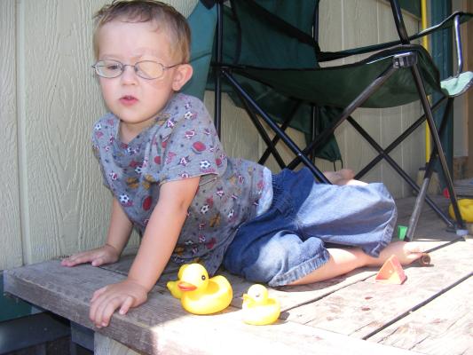 Noah patching on the porch.