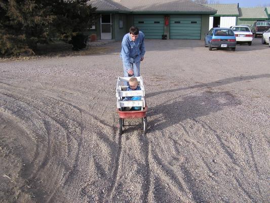We made lots of wagon ruts in Great Grandma's driveway.