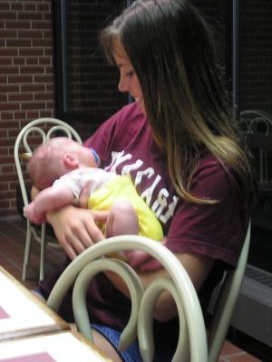 Lindsay holds the baby