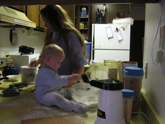 Noah helps mommy bake some rice bread.