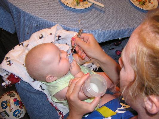 Sarah likes to eat with a baby spoon.