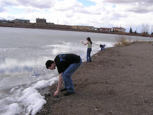 It's fun to try to skip the rocks on the slush and keep them from sinking.