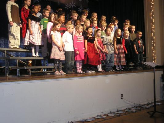Andrea sings with her class at the Holiday program