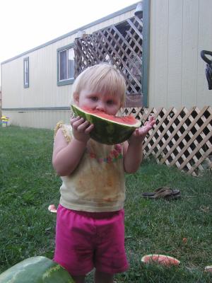 Sarah eats some watermelon.