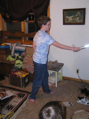 Jedi Joe swings the light saber.