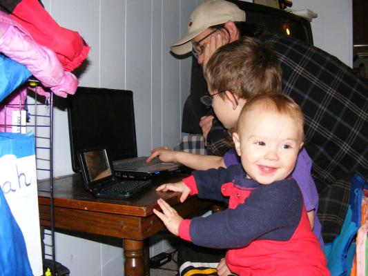 Joshua Noah and Grandpa (Robert) on the computer. 