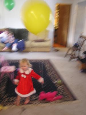 Sarah plays with a balloon