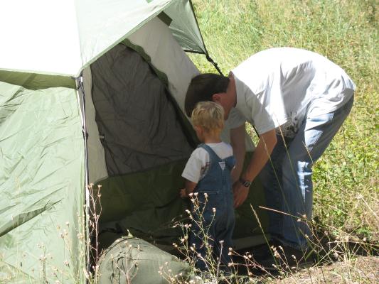 David and Noah put up the tent.