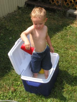 Noah plays in our swimming pool.