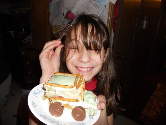 Andrea with her truck cake for Joshua's birthday. 