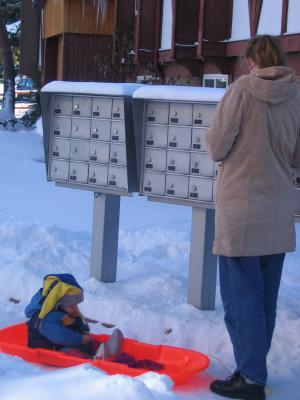 Noah and Katie use the sled to get to
the mail box to check the mail.
