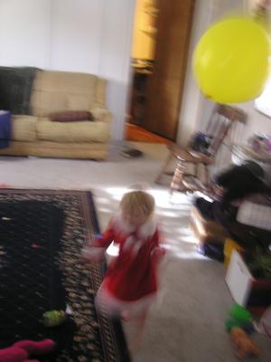 Sarah plays with a balloon