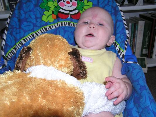 Sarah and her stuffed puppy.