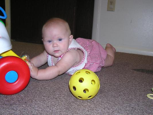 Sarah might go after the yellow ball.