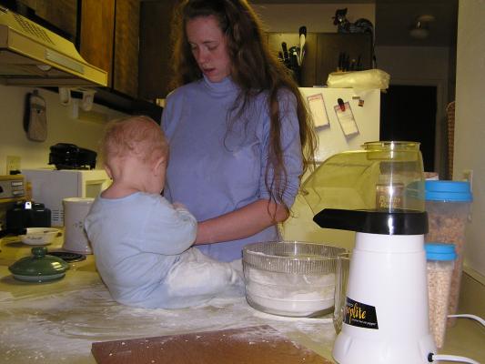 Mommy notices that Noah has a lot of flour on him.