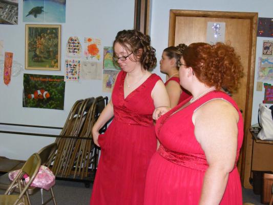 The bride's maids in red.