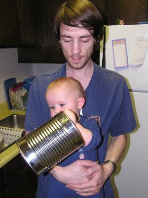 Noah shows dad some of the finer features of cans.