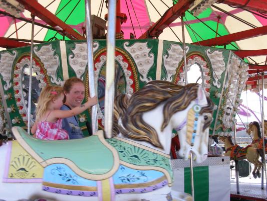 Sarah and Katie on carnival ride.