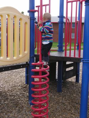 Noah is good at clmbing at the playground.