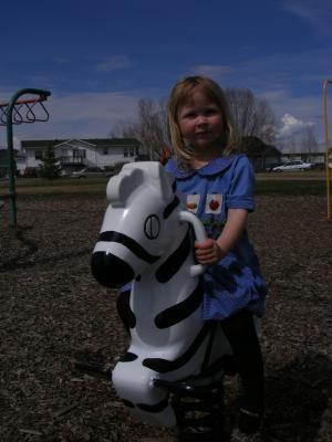 Sarah on a Zebra