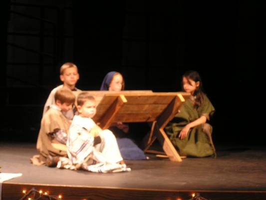 Jackson played Joseph and Allison played Mary. Shepherds are Max, Adam and Malia