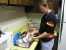 Noah helps mommy wash the dishes. thumb