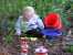 Noah found some pinecones to put in his bucket. thumb