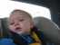 Noah in his car seat on the way to Church. thumb