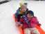 Noah and Sarah in a sled. thumb