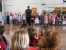 First graders singng for international day for Irving School thumb