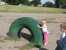 Noah and Sarah at the park in Covered Wagon Mobil home park. thumb