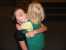 Sarah hugs malia after Malia\'s baptism. thumb
