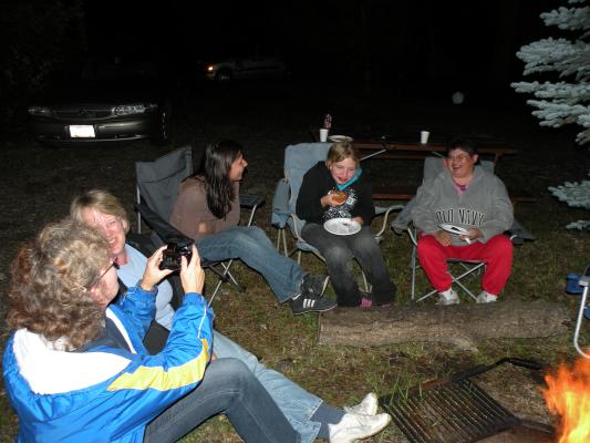 Cheryel, Deb, Rachael, Tori and Vonnie are enjoying the campfire.