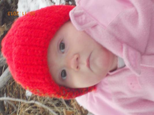 Hannah in a red hat.
