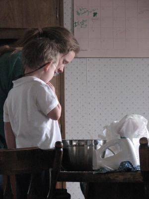 Katie and Noah making a cake.