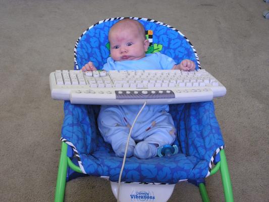 Noah writing his first computer program.