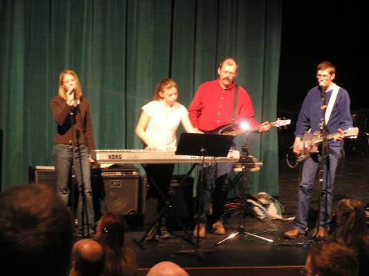 The band leads worship.