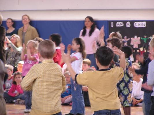 Andrea singing with her class.