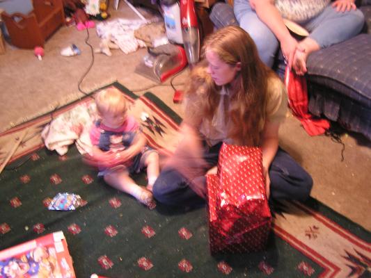 Katie and Sarah open presents