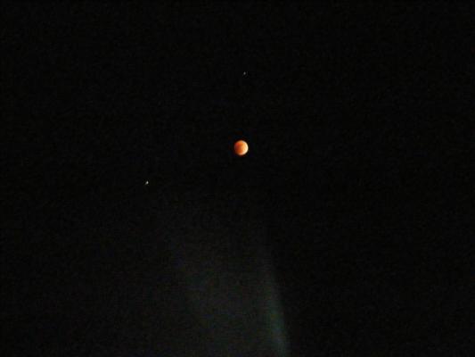 Lunar eclipse with Saturn on the left.