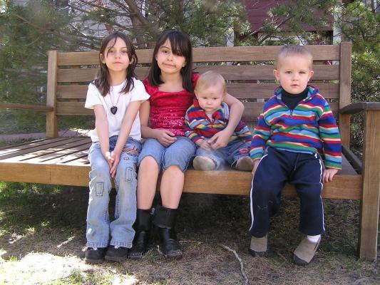 Andrea, Malia, Sarah and Noah on the bench.