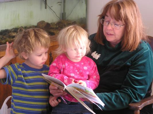 Grandma Eder reads Noah and Sarah a story