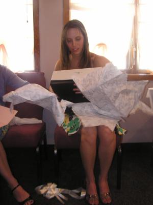 Lindsay opens gifts at her bridal shower