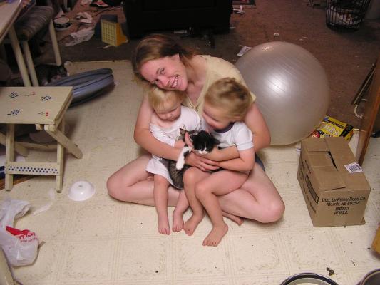 Katie, Sarah and Noah with kittens
