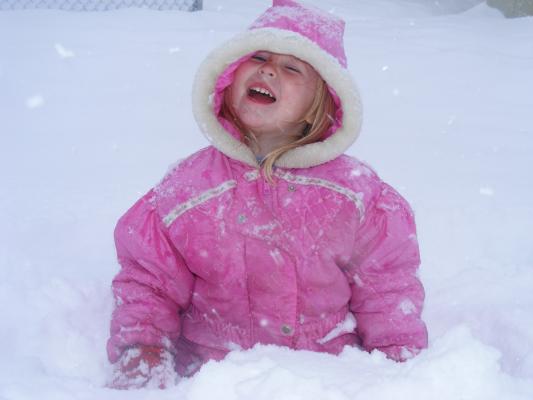 Sarah loves to play out in the snow.