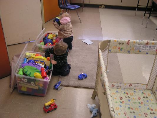 Noah and Sarah play in the church nursery.