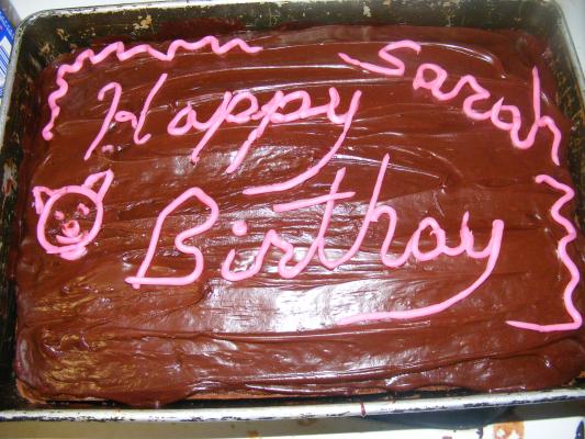 Grandpa decorated a cake for Sarah
