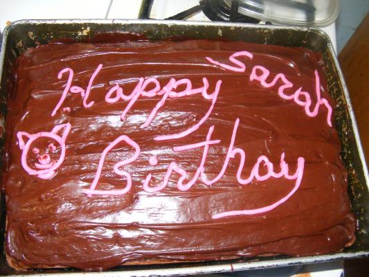 Grandpa decorated a cake for Sarah