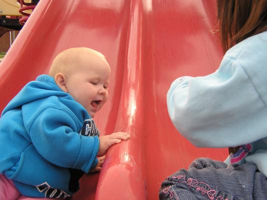 Sarah is having fun with Adrea at the park.